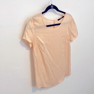 Quince silk short sleeve top in peach / apricot color. Size XS. Washable silk.